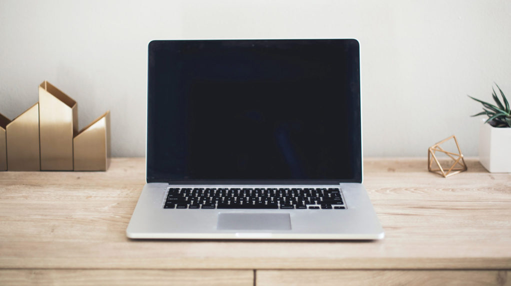 A computer sitting on desk